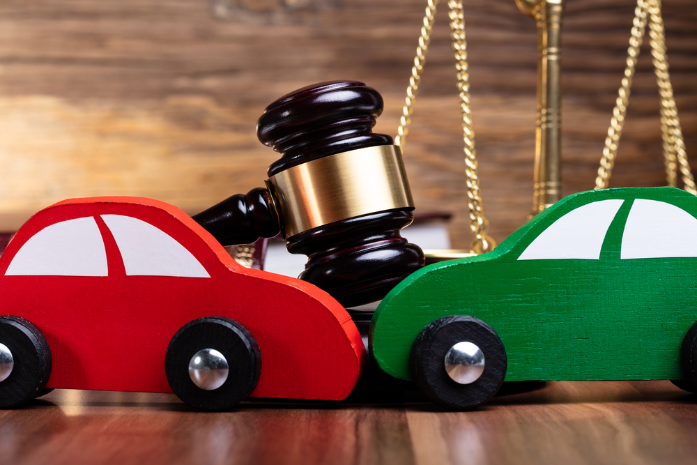 4 Reckless Driving Myths - Two Green And Red Wooden Cars